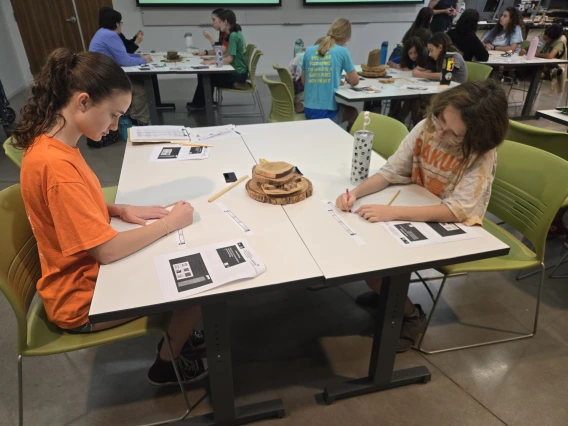 Students at work in a dendrochronology class at the laboratory.